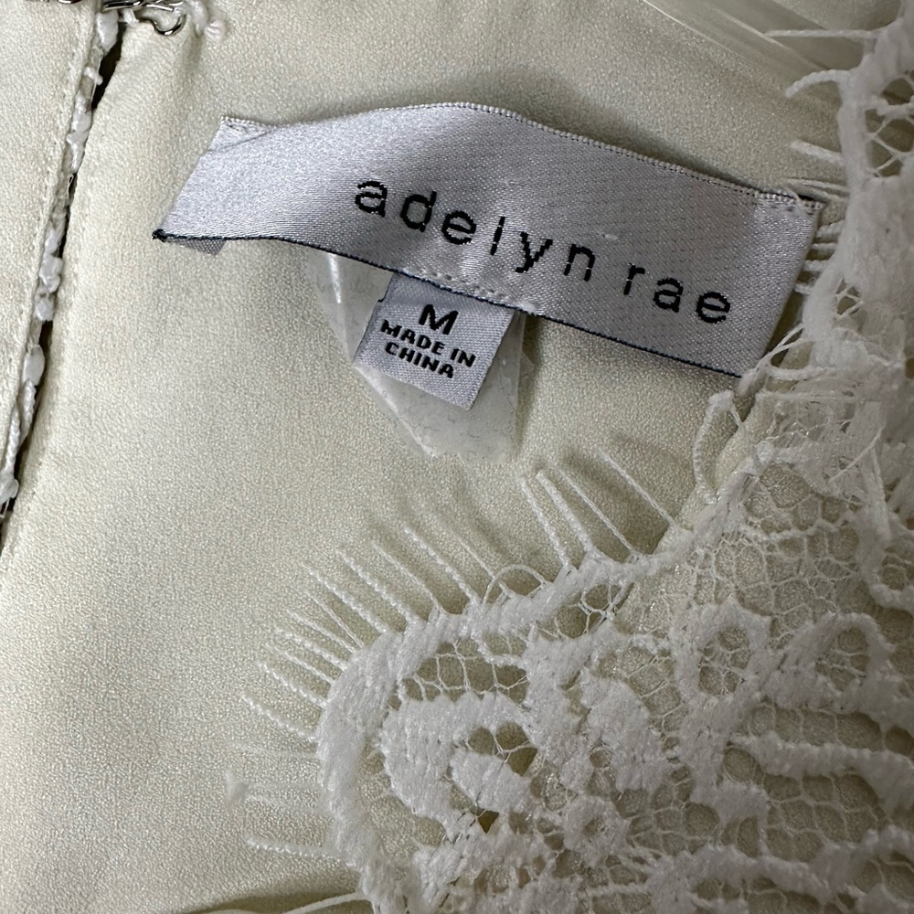 Lacy a line shift flapper Lace up front eyelash hem Suzanne dress by Adelyn Rae - Picture 5 of 8